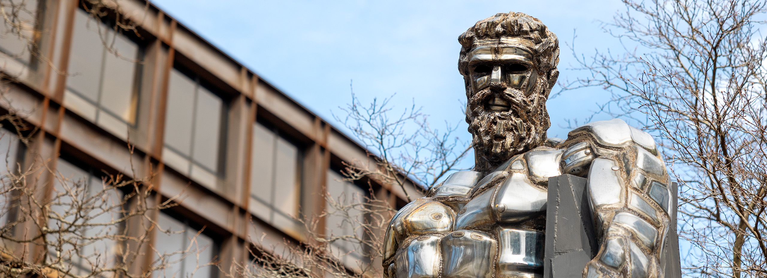 Herakles in Ithaka I, a welded chrome-plated steel sculpture by Jason Seley installed between Statler Hall and Uris Hall at Cornell University, Ithaca, NY
