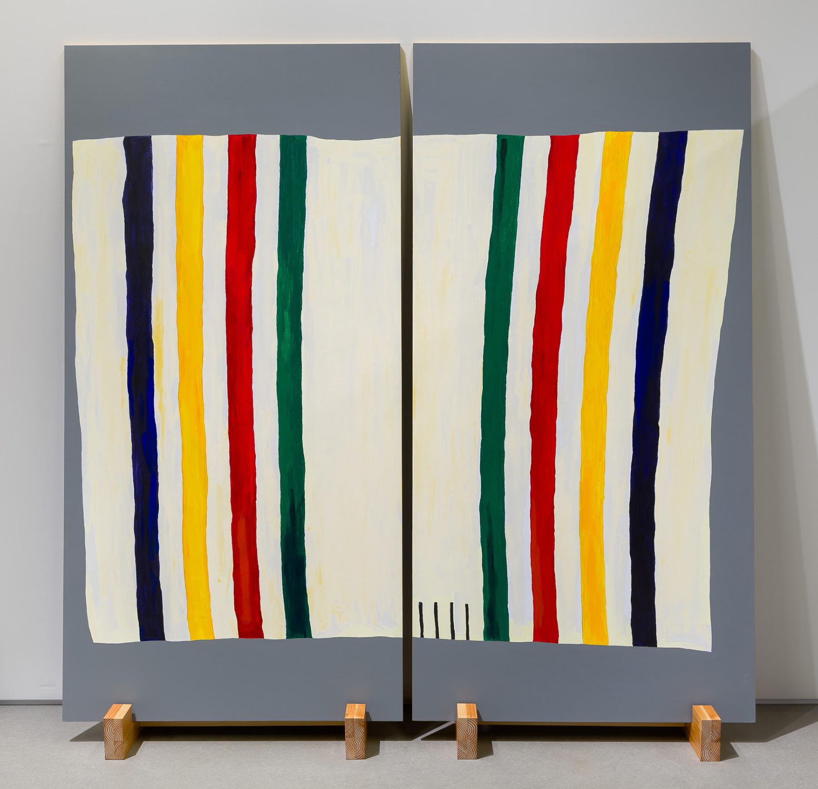 Two tall panels painted with gray horizontal stripes at top and bottom and white, blue, yellow, red, and green vertical stripes in the center