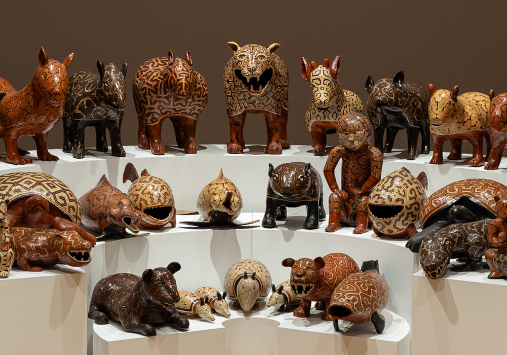 Three rows of different ceramic animal figures