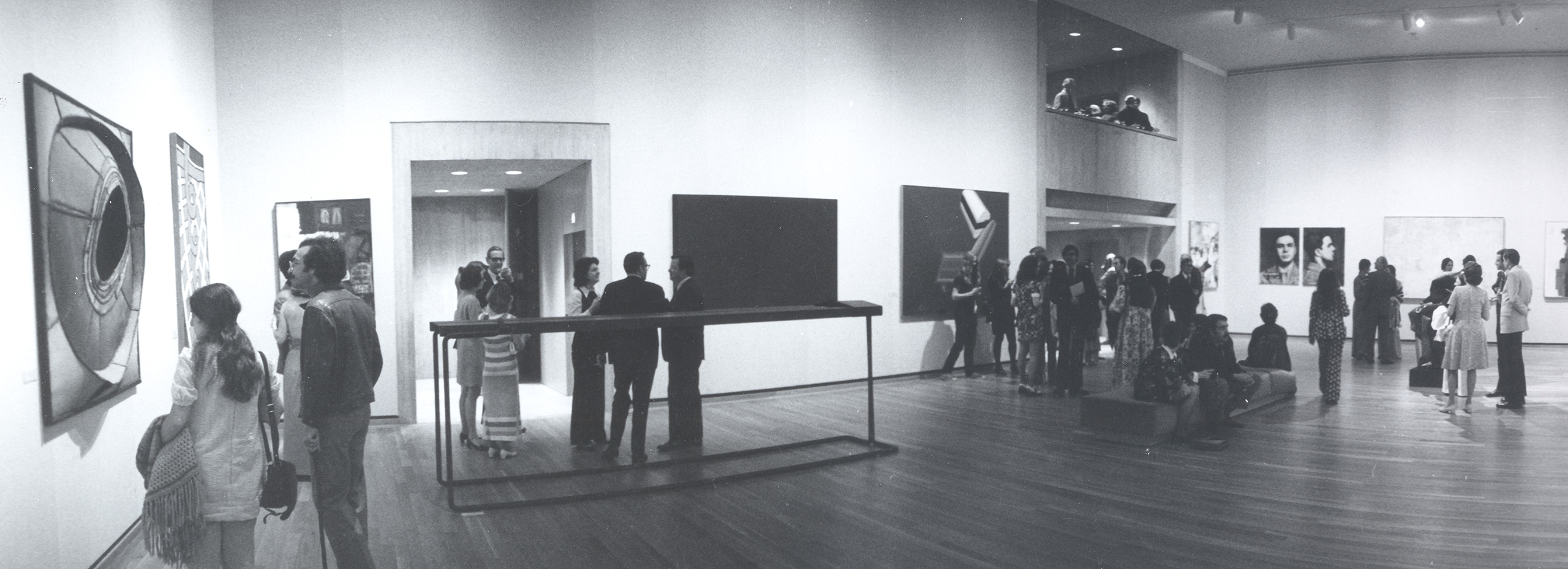 A black and white photo of an exhibition gallery at the Herbert F. Johnson Museum of Art in 1973.