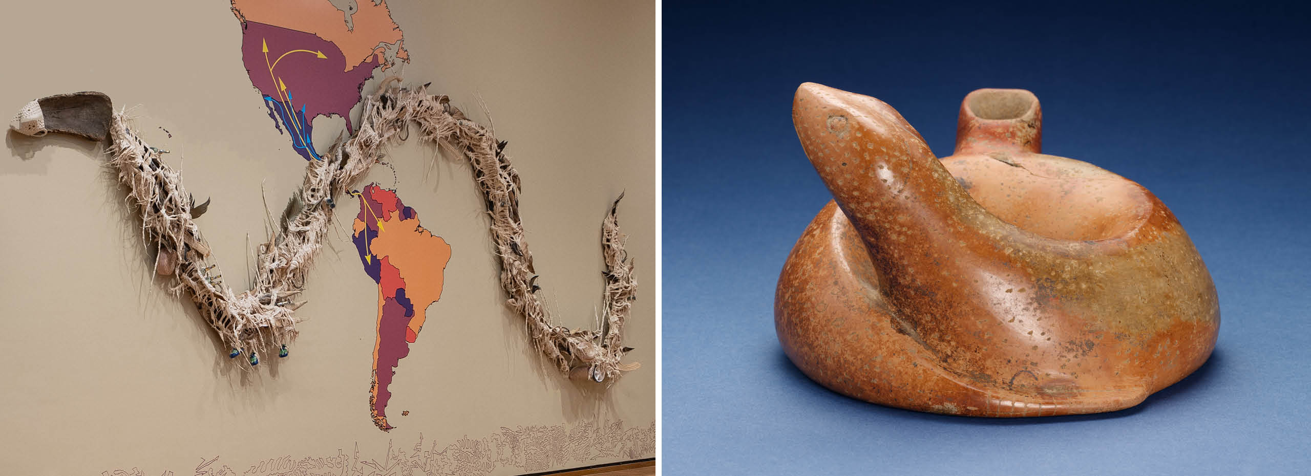 At left, a large snakelike sculpture hangs on a wall over a colorful map of North and South America. and at right, a small tan ceramic of a coiled snake figure