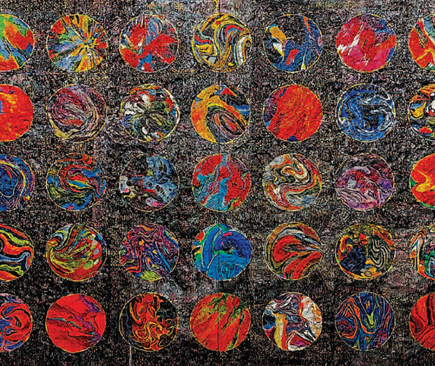 A even grid of colorful circles fills a dark background