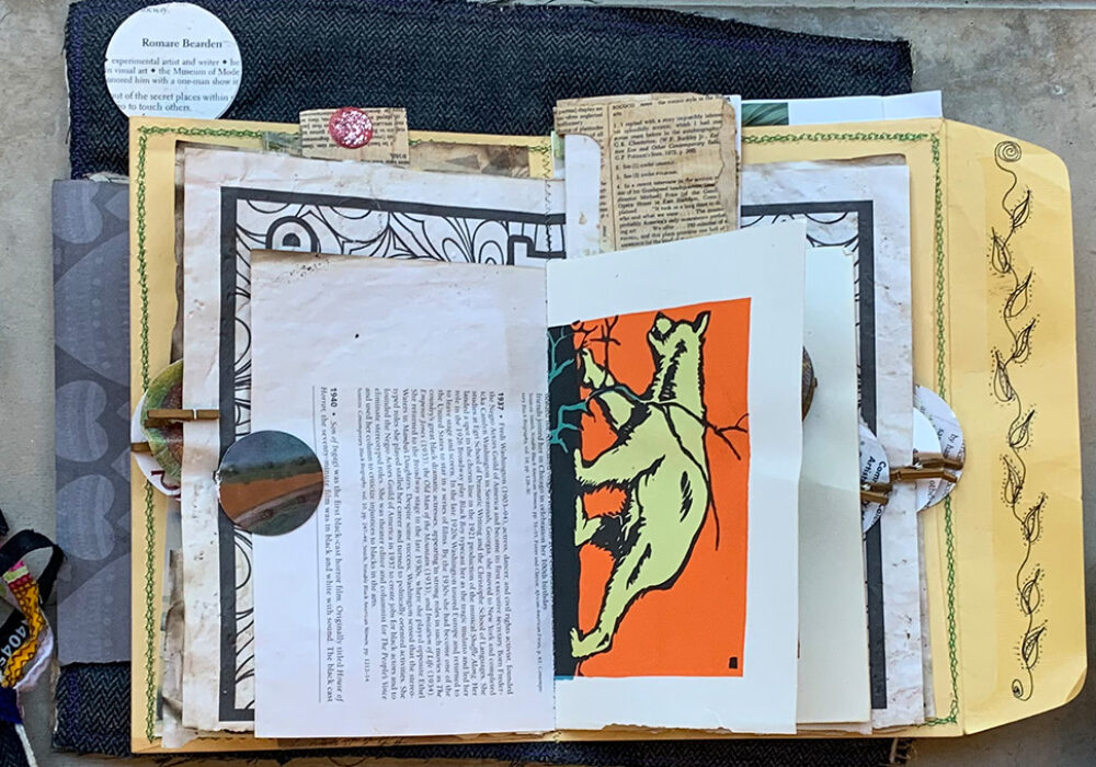 A colorful open scrapbook of images and clippings